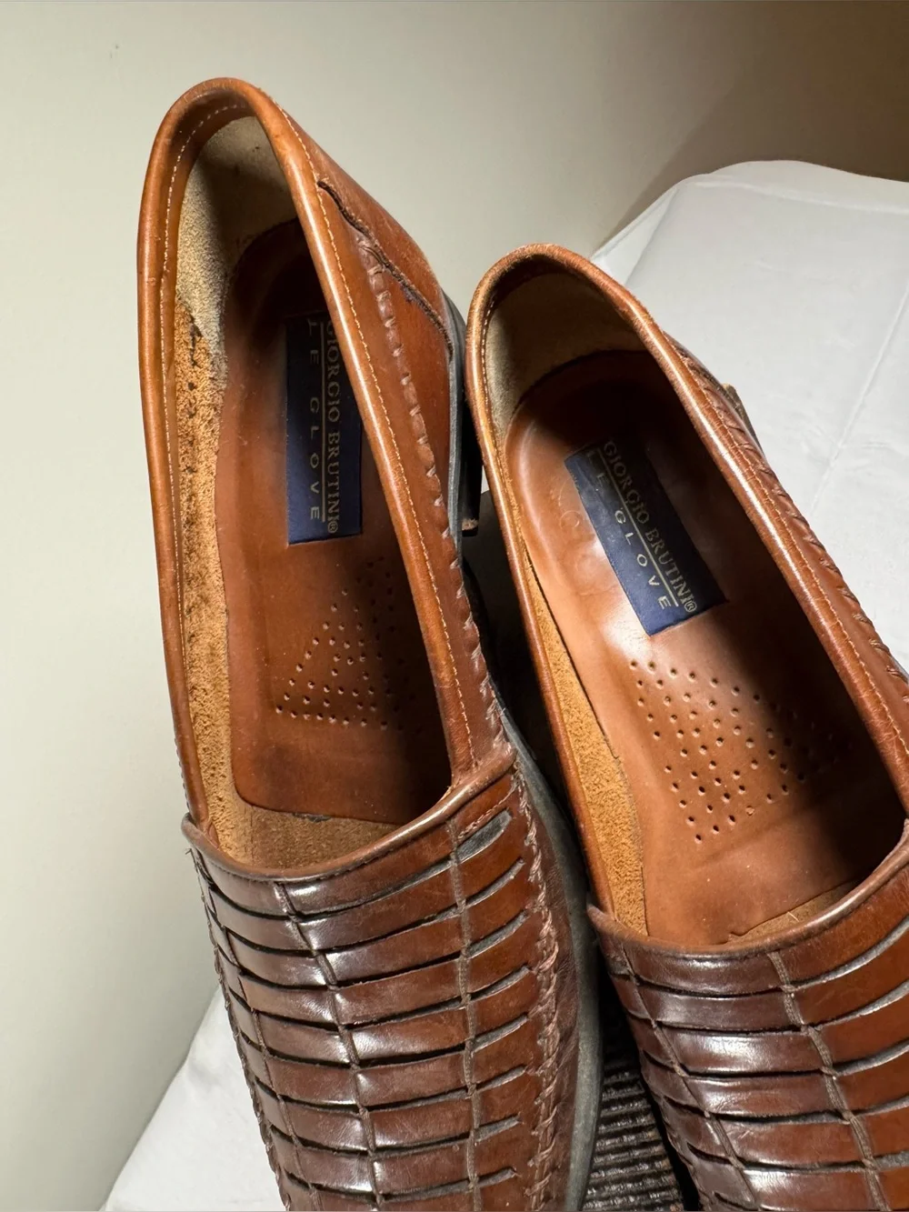 Giorgio Brutini brown leather slip-on loafers featuring a woven design